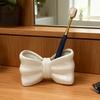 1PC Creative Ceramic Cute Bow Electric Toothbrush Holder Bathroom Wash Table Decorative Toothpaste Toothbrush Storage Ornament