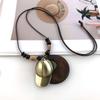 Vintage Boho Sweater Chain Leather Chain Long Wooden Pendant Necklace Handmade Hollow Leaves Clothing Pendant for Women Men