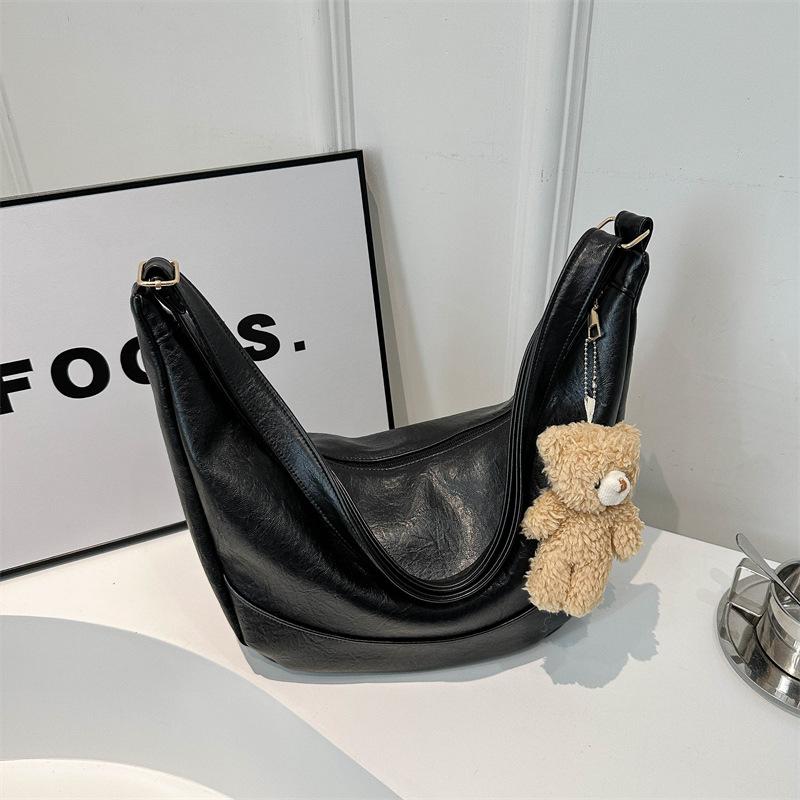 

Нишевая текстура, простая и модная корейская версия, однотонная сумка через плечо для женщин, весенняя, новая повседневная сумка-пельмень через плечо No pendant