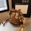 Feeling niche retro woolen bucket small bag women's 2026 new fashionable large-capacity portable shoulder bag