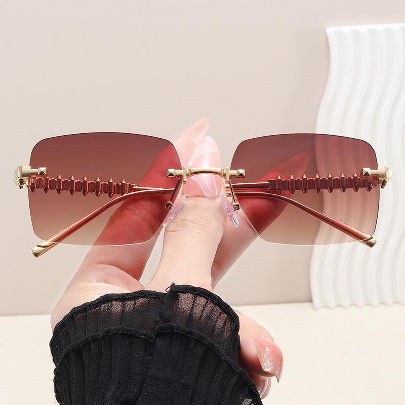New Frameless Premium Metal Rivet Leg Sunglasses Fashionable Vacation Driving Sunscreen Women's Sunglasses