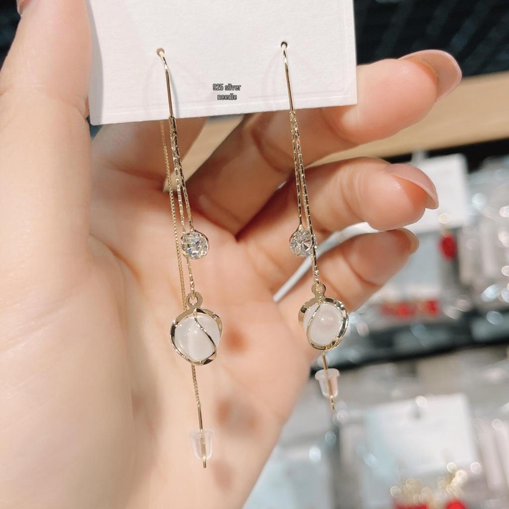Cat's Eye Tassel Ear Chain 2024 Trend: Elegant Long Earrings with Light Luxury Design