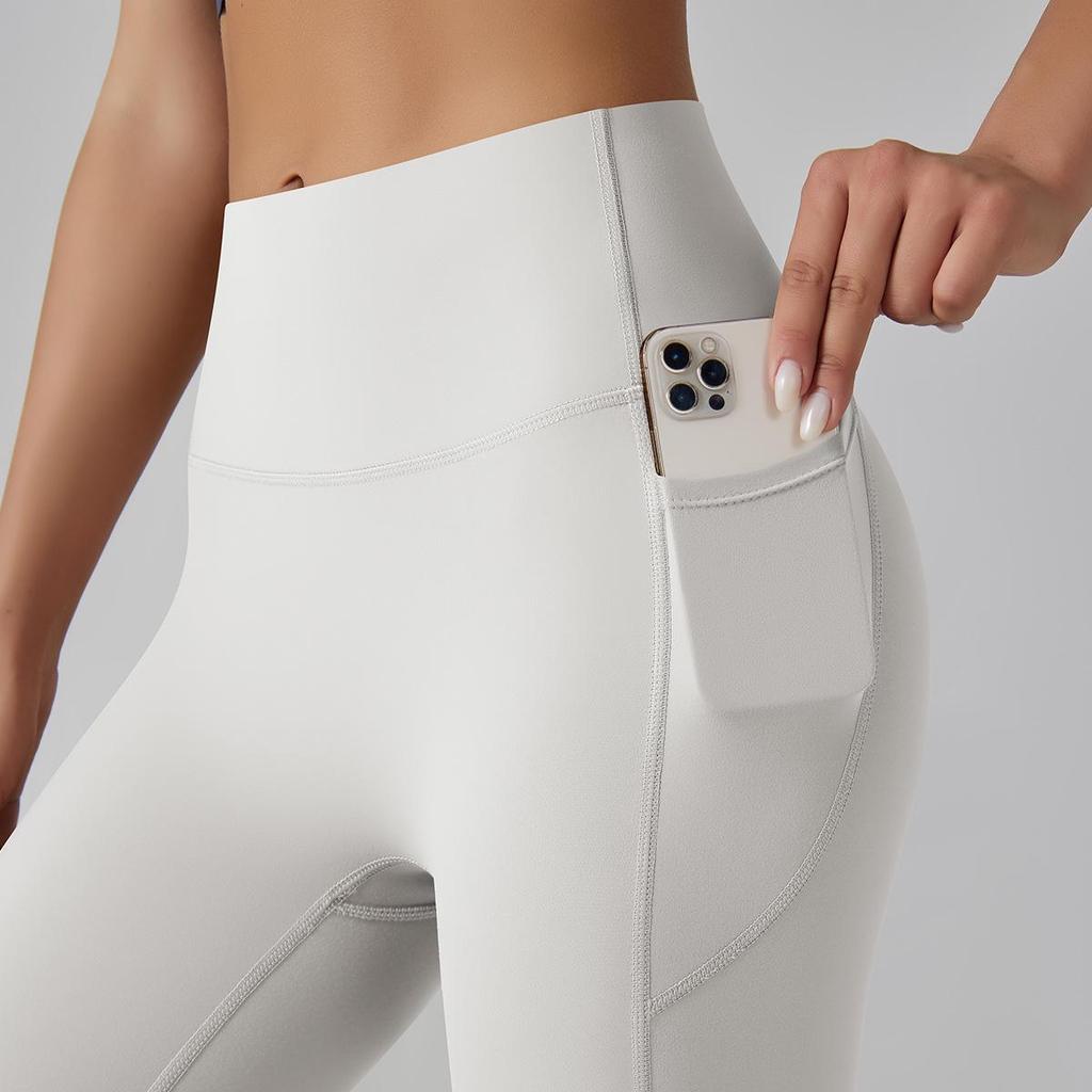 Women's High-Waisted Seamless Yoga Pants with Pockets - Quick-Dry, Tight-Fit, Brushed Fabric, Butt-Lifting Sportswear for Running & Fitness