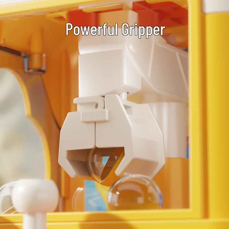 Kids' Claw Machine: Mini Home Toy for Grabbing Dolls and Gashapon - Ideal Educational Gift for Boys and Girls in Kindergarten.