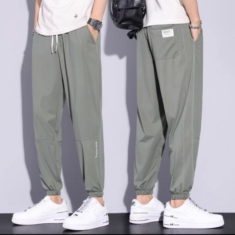 

Ледяной шелк спортивные штаны лето тонкие новые мужские молодежные свободные леггинсы кондиционированные спортивные штаны 4XL зелёный