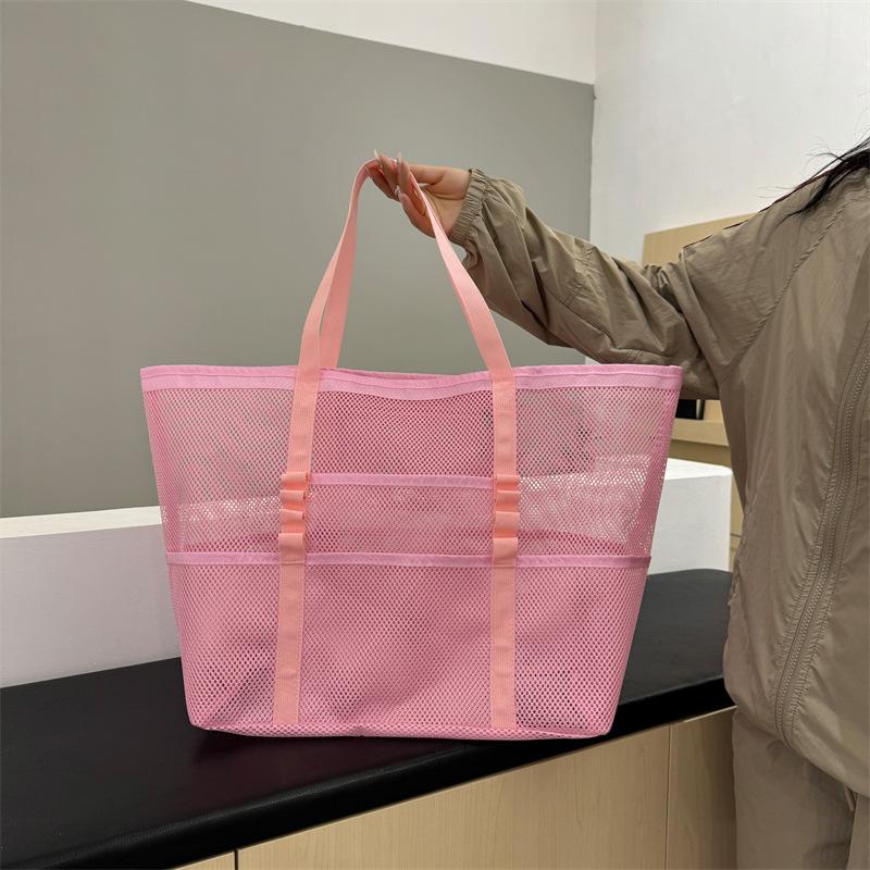 New high-end mesh bag, light and large-capacity travel bag, fitness sports storage, shoulder bag.