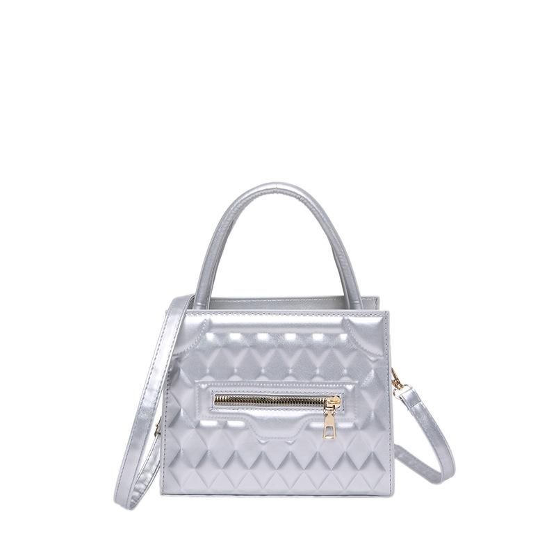 

Fashion diamond pressed shell women s handbag 2024 early autumn new simple Korean version foreign style one shoulder messenger bag tide срібний