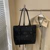 Large-capacity commuter tote bag women's fashion versatile shoulder bag new niche simple leisure bag