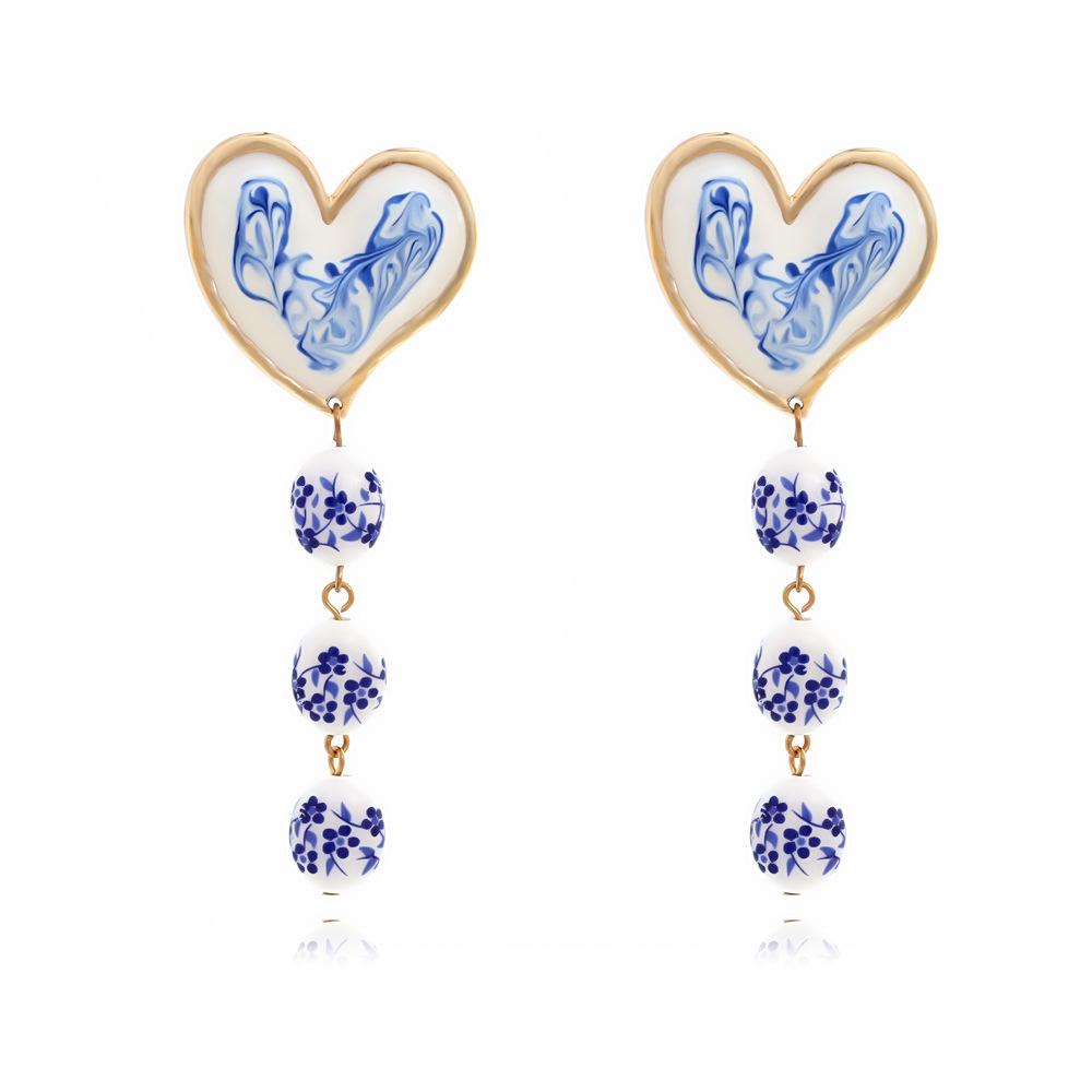 Модные серьги-подвески для женщин