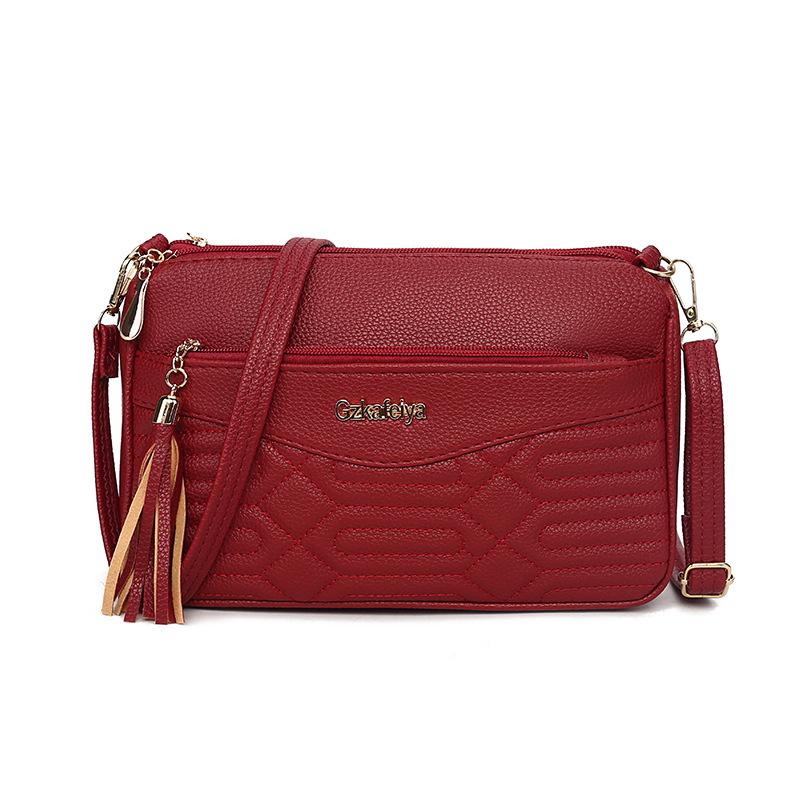 

Retro commuter fringed bag autumn and winter new large-capacity fashion shoulder underarm bag high-end versatile diagonal span bag women