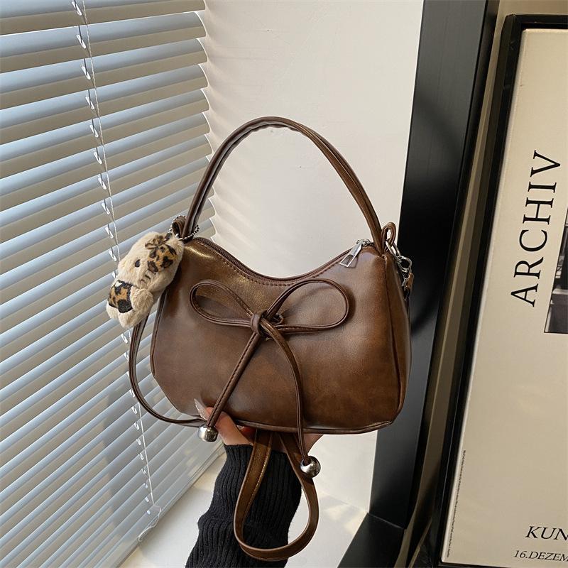 Bag niche design bow hand bag versatile commuter messenger bag Maillard bag women