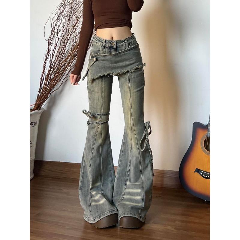Jeans a zampa alla moda da High Street Donna Pantaloni in denim strappato Design bootcut Look vintage trendy
