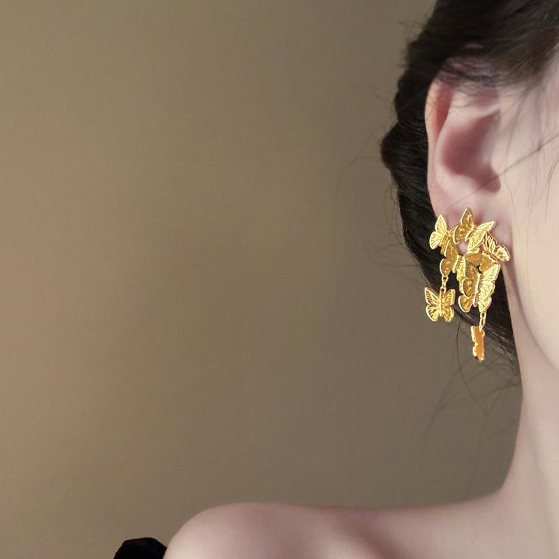 Náušnice se střapcem z dutých květů s postříbřenou jehlou a pozlacením - Evropský a americký niche design