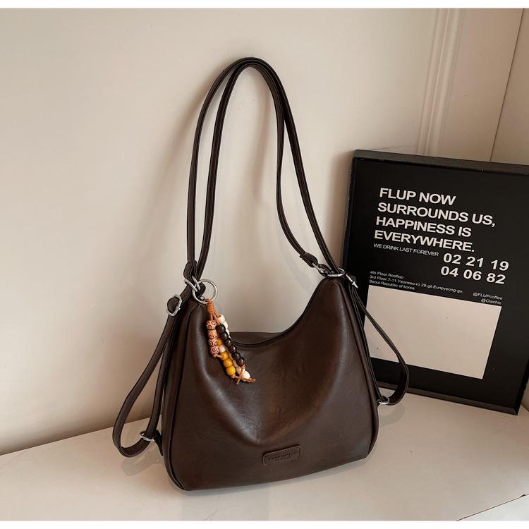 

2025 autumn and winter new casual versatile backpack retro fashion shoulder bag large capacity commuter tote bag women s bag темно-коричневого