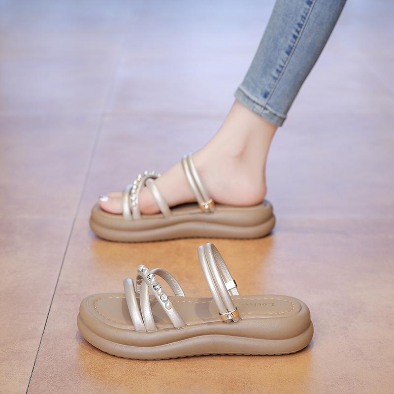 

Two women wearing cool slippers 2025 new summer Korean version fashion one-word pearl thick-soled soft-soled Roman slippers women 41