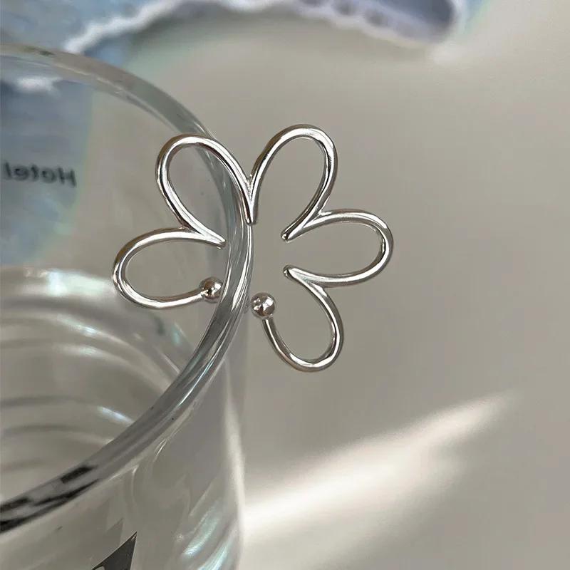 

1PC Trendy Creative Hollow Flower Ear Cuff Exaggerated Fake Pierced Earring Ear Bone Clip for Women Girls Aesthetic Jewelry Gift серебряный