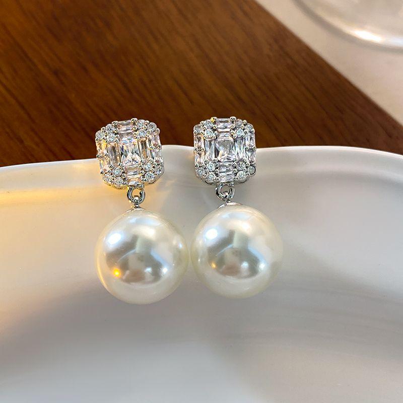 

Доступная роскошь Модные серьги-пусеты с жемчугом Шицзя Женские уникальные красивые серьги Серьги для особых случаев Новинка 2025 года Самые продаваемые серьги-подвески Silver full of pearls