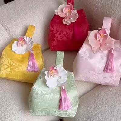 Sweet Orchid Flower Tassel Knot Wrist Bag Temperament Printing Wedding Candy Bag Make Up Pouch Small Item Pouch Banquet