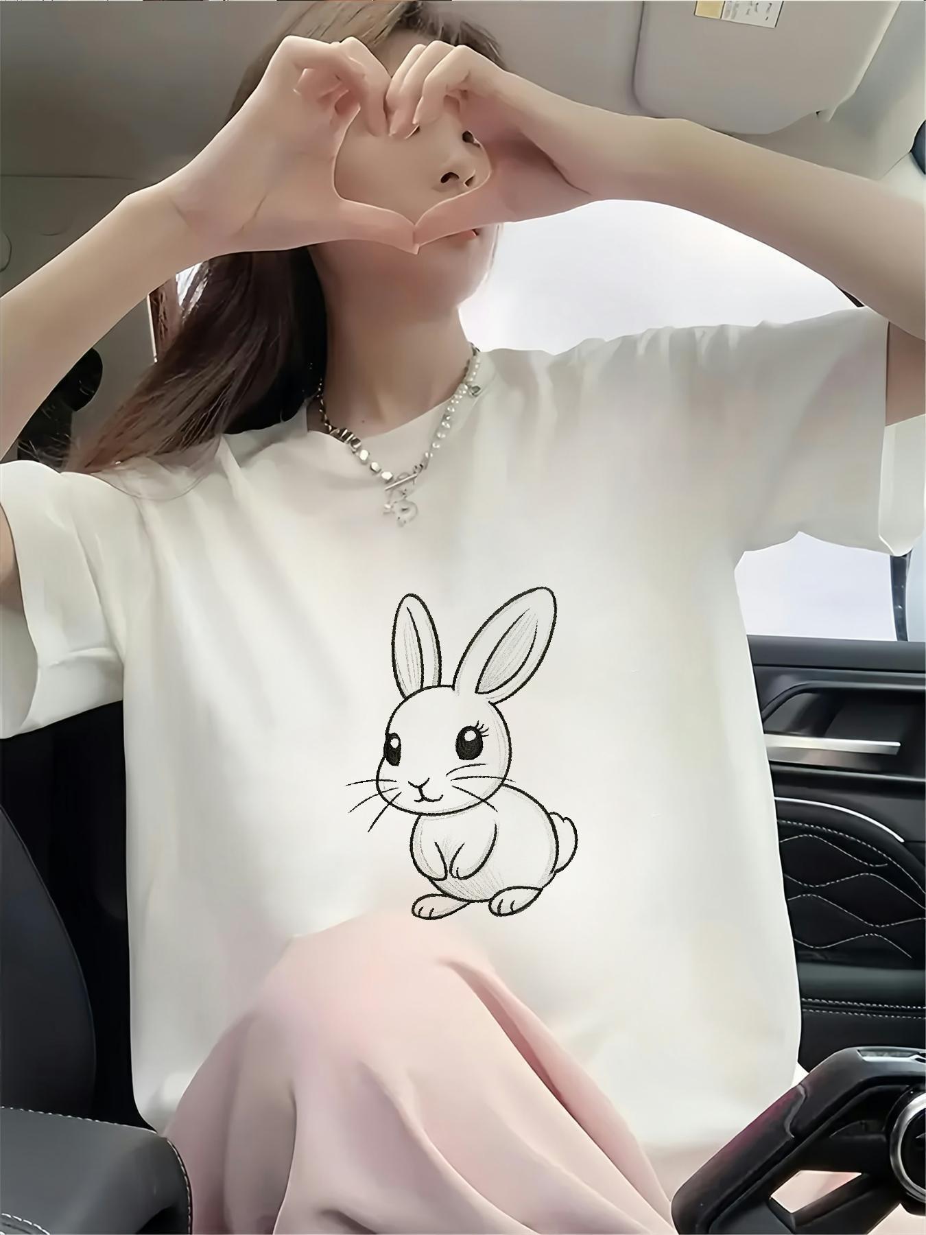 

A Simple Drawing of a Rabbit. The Character Is Wearing a Thick Black Printed Short-sleeve T-shirt, Which Is Breathable for Men, Machine Washable, Has 5XL різнокольоровий