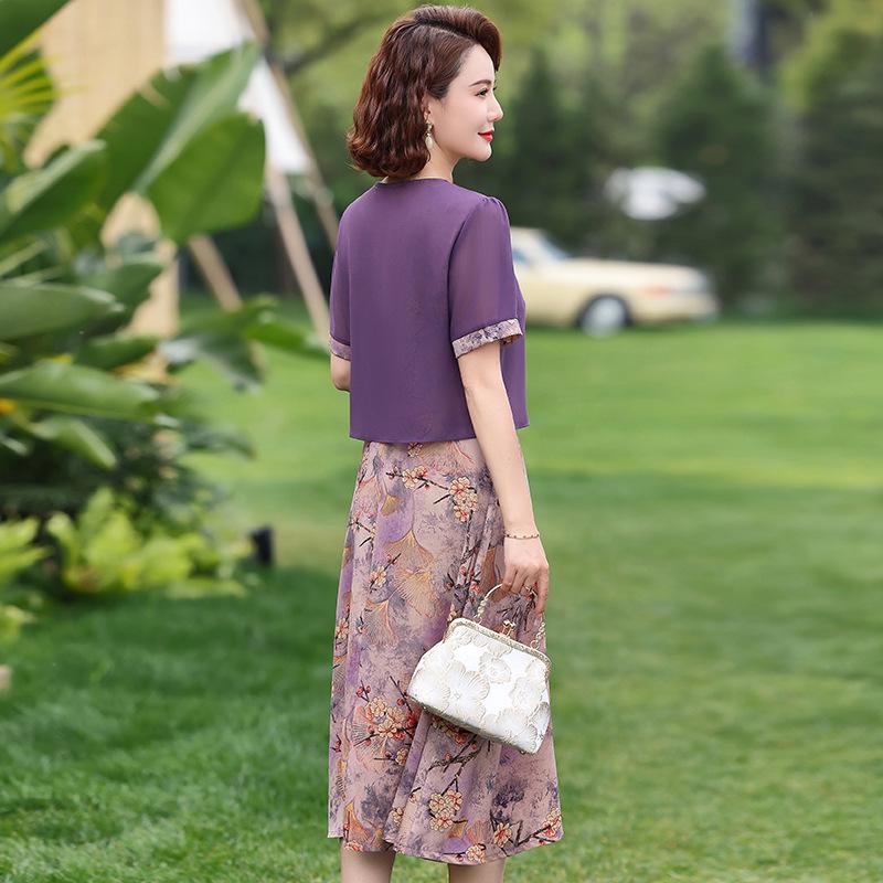 

Новое летнее шифоновое платье 2025 года для женщин среднего возраста: С короткими рукавами, стильная юбка средней длины 5XL (143-155 jin) фиолетовый