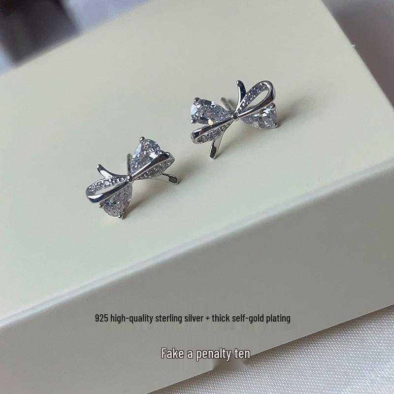 

Трендовые серьги-пусеты женские из стерлингового серебра 925 пробы с цирконом в виде банта в стиле легкой роскоши 2023 925 Sterling Silver