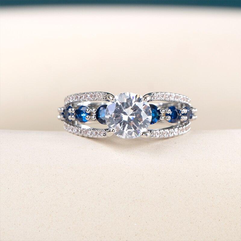 

Bella Box Новое поступление полое кольцо женское кольцо с полным прокладыванием камня CZ ослепительный подарок на годовщину свадьбы для женщин кольца высокого качества 9 синий