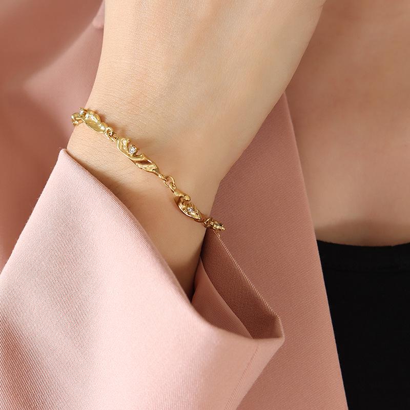 Irregular Inlaid Zircon Titanium Steel Bracelet with 18K Gold Plating