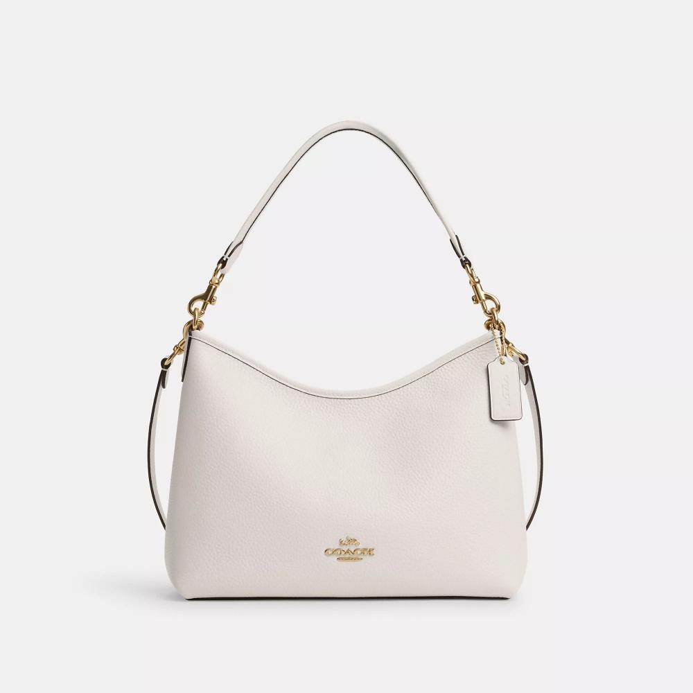 

Сумка через плечо Coach Laurel золотистого цвета с мелом