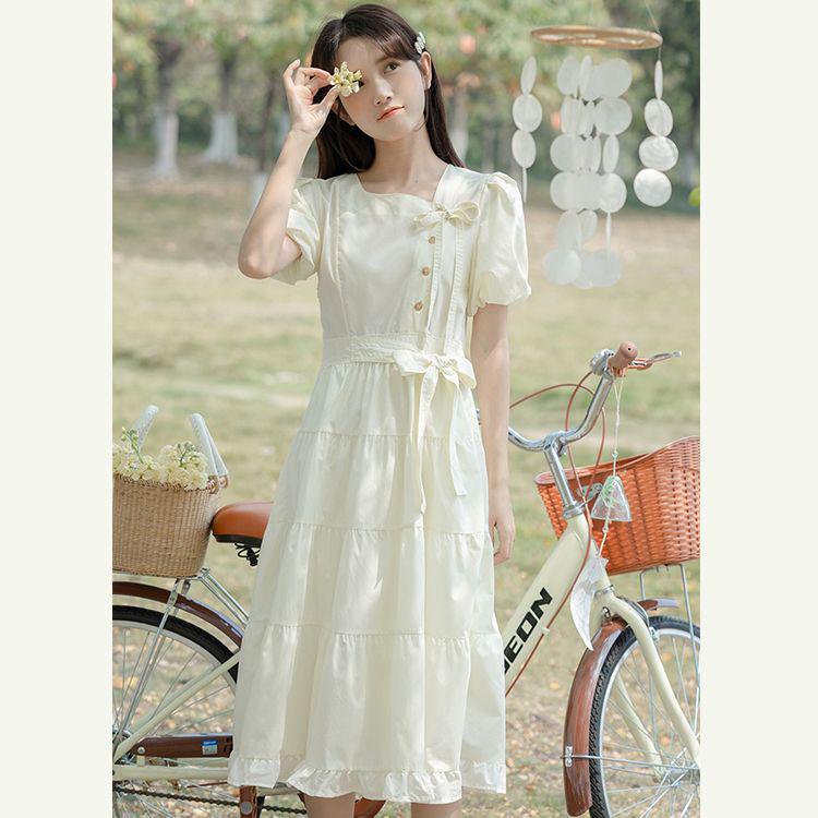 Retro Sommerkleid mit Puffärmeln, Schleifenbändern und taillierter Taille