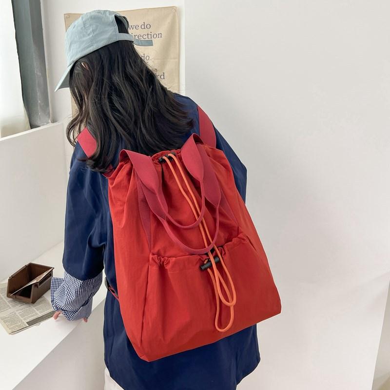 Schoolbag solid color large-capacity backpack new simple and versatile fashion girl outdoor backpack Korean version of student schoolbag