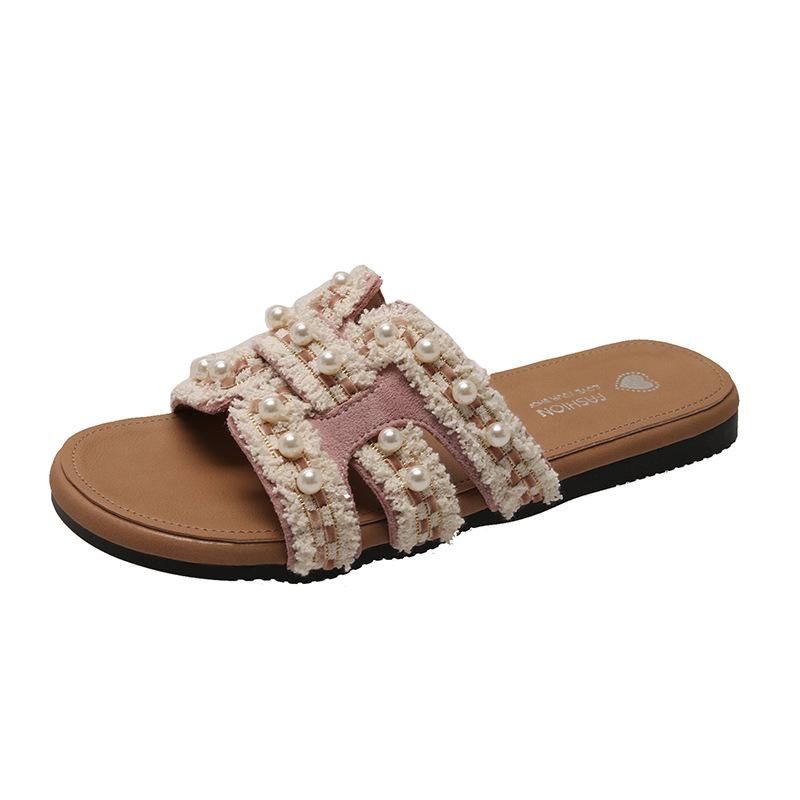 

Beautiful flat-bottomed cool slippers female summer wear 2025 new fairy style with skirt beach lazy one-word drag 40
