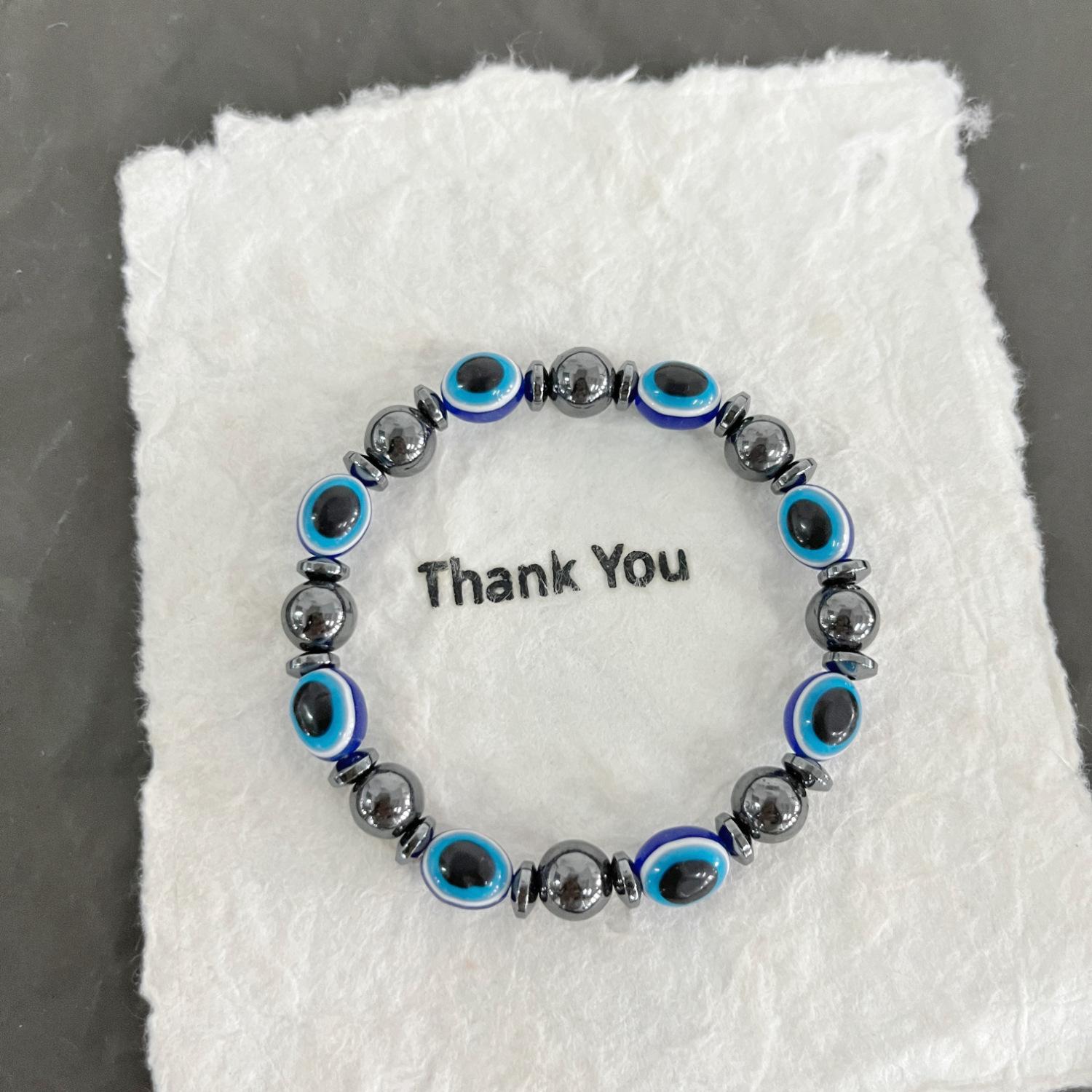 

JYL TS Bracelet Elastic Magnetic Bead Evil Eye Charm Balances Energy & Luck T144 темный мандарин