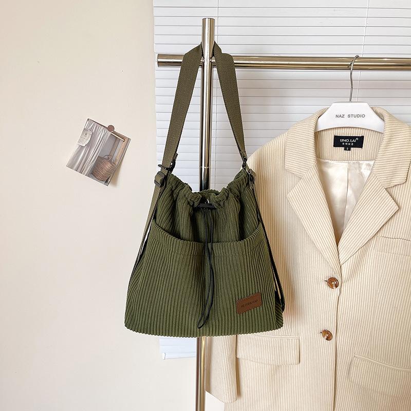 

Женская сумка-тоут 2025 новая большая вместительная сумка-рюкзак из парусины универсальная модная дорожная сумка 32*10*31 зелёный