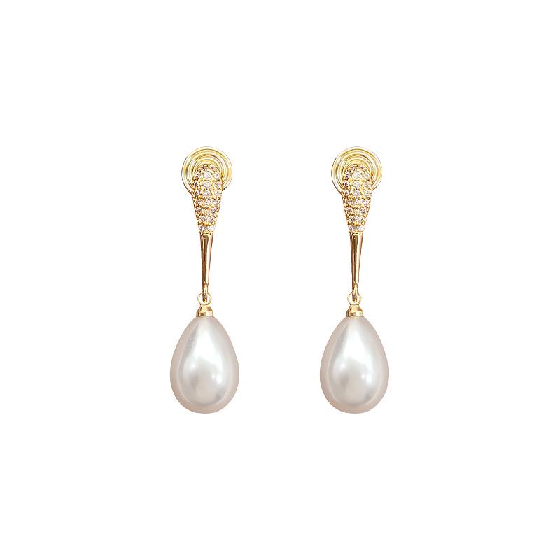 Pearl Ear Clips: Painless, No-Pierce Mosquito Coil Design Earrings for Women - Elegant and High-End.