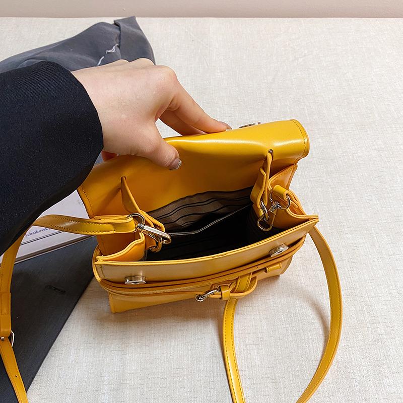 Mini Structured Crossbody Bag with Top Handle and Belt Detail Elegant Women's Shoulder Bag for Daily Use and Fashion Outings