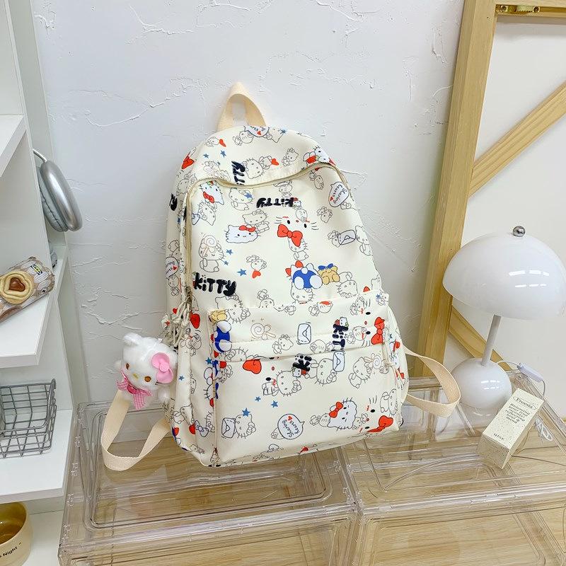

Kitty Graffiti Schoolbag: Cute, Versatile, Lightweight Backpack with Decompression Straps and Large Capacity for College Students