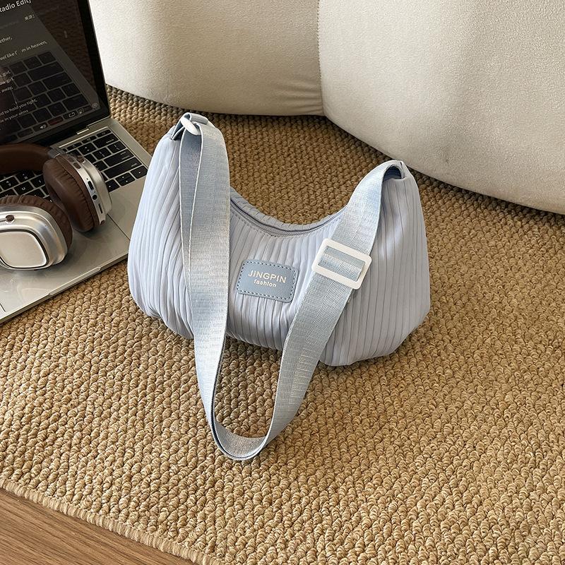 Large-capacity Spring and Summer Simple Shoulder Bag with Side Pocket for Carrying On The Shoulder or Across The Body Casually