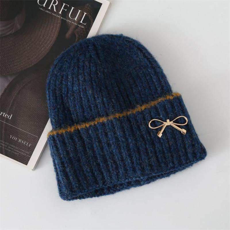New autumn and winter women's bow knitted hat big head circumference thickened warm ear protector wool hat shows small face cold hat
