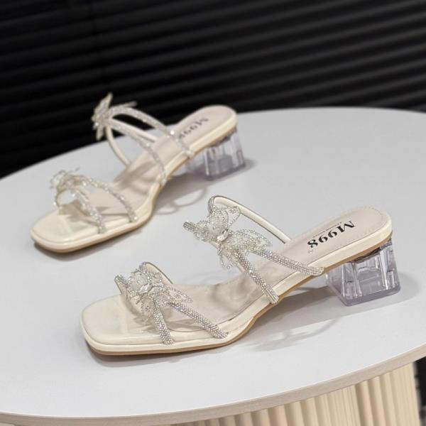 

Модная обувь Женские тапочки Каблуки Квадратный носок Пантофли Бант-бабочка Блестящие шлепанцы Модные Мягкие Высокие 2025 Блок Желе Роскошный Кристалл 35