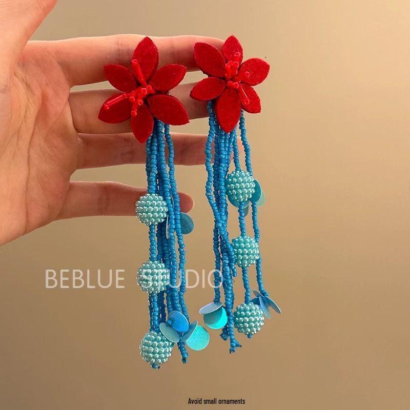 Light Luxury Flower Pattern Tassel Earrings: Niche Design with High-End Versatile Appeal