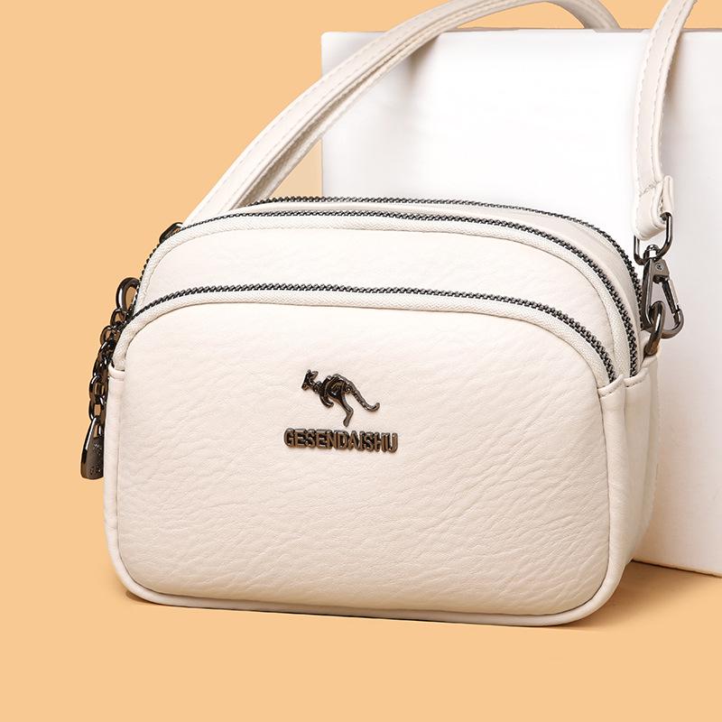 

Trendy Women s Leather Crossbody Handbag: 2025 Fashion Multi-Layer Small Square Phone Bag. жовтий