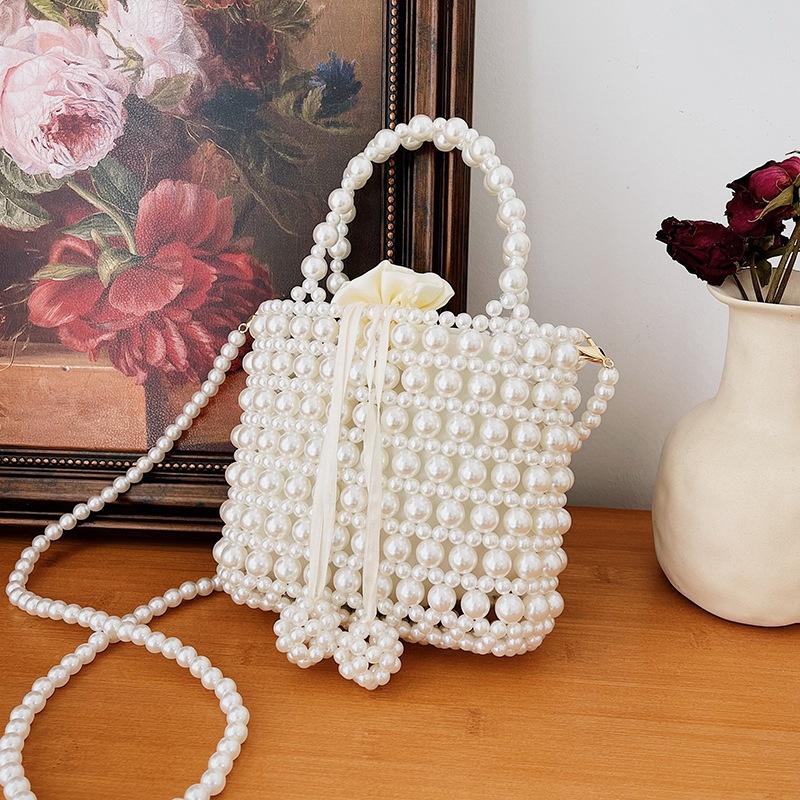 Spring beaded retro fashion sweet pearl hand strap personality trend shoulder personality messenger women's bag