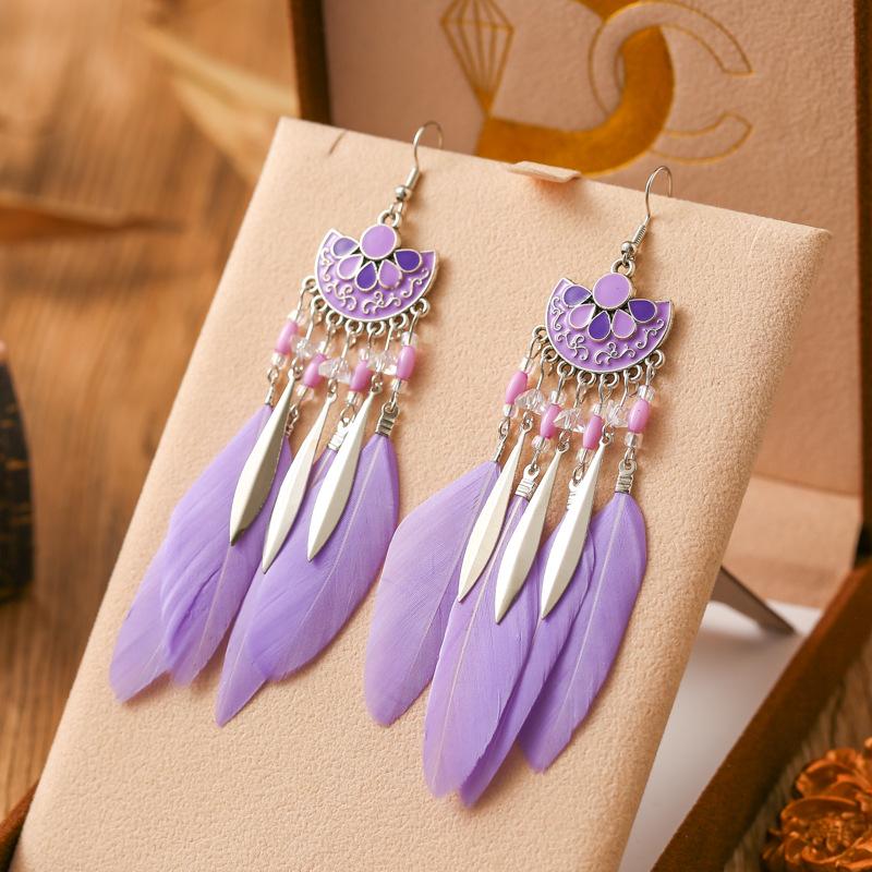 Neuer Drop Oil Fächerförmiger Federohrring für Damen Mode Bohemian Langer Silberfarbener Metall Reiskorn Hänger Ohrring Schmuck