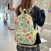 High-value schoolbag women's large capacity new fashion small floral backpack Japanese junior high and high school student backpack