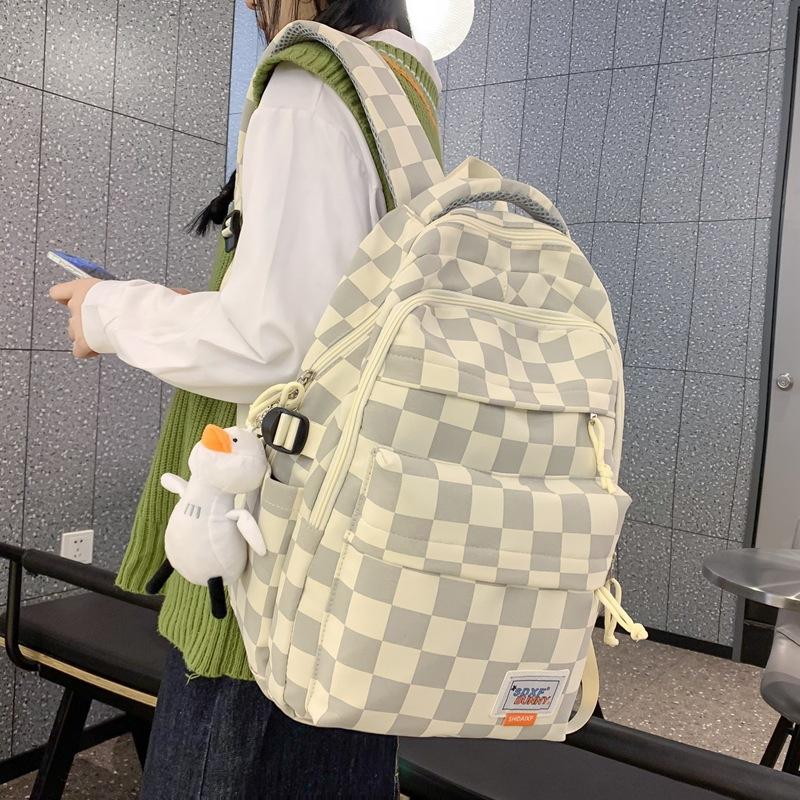 

Korean version ins literary and artistic style plaid backpack Japanese Harajuku small fresh high school junior high school student schoolbag Single pack