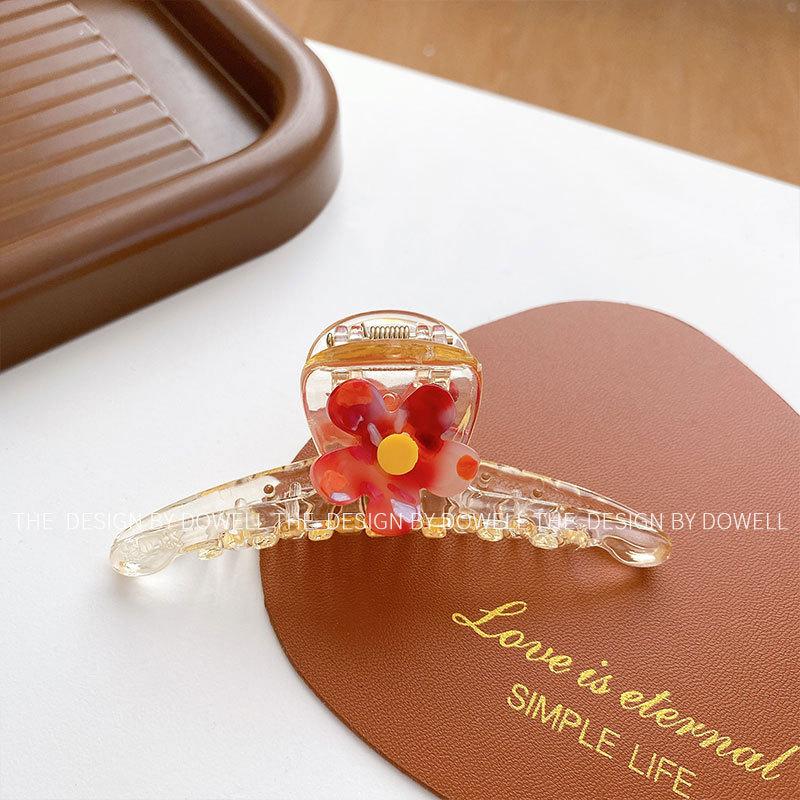 

Elegant Resin Floral Hair Claw In Vibrant Color Variations Ideal For Fashionable Women Red Flower