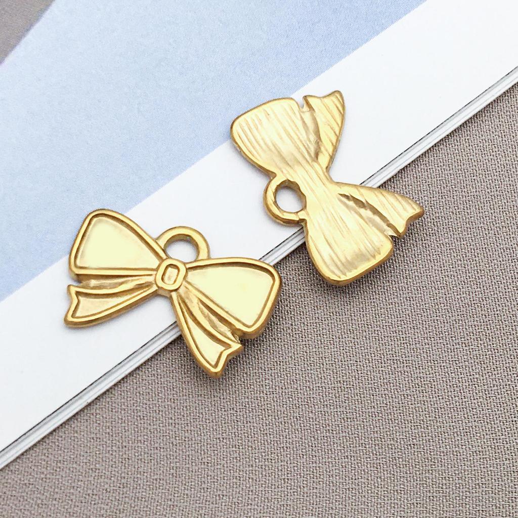 Gold Stainless Steel Bow Necklace & Bracelet Set - Versatile Pendant, Charm, DIY Earrings, Fashion Jewelry Accessories.