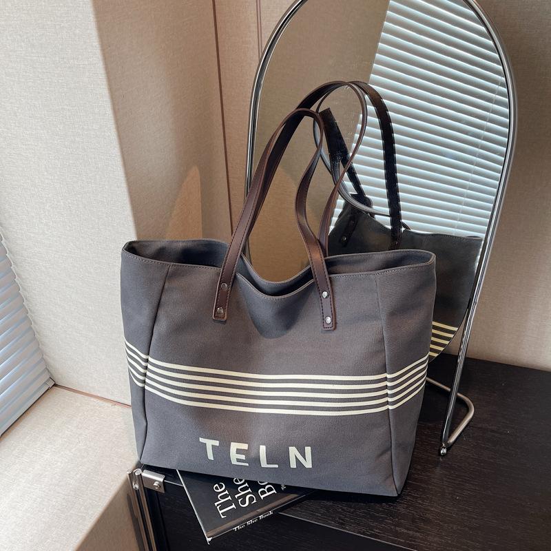 

Large-capacity canvas bag women s autumn and winter versatile new shoulder bag college students commuting tote bag