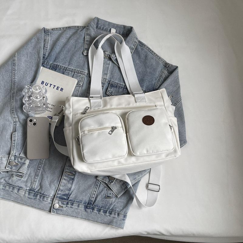 College students commute to class, large-capacity handheld cloth bags, large bags, women's new casual canvas bags, shoulder tote bags