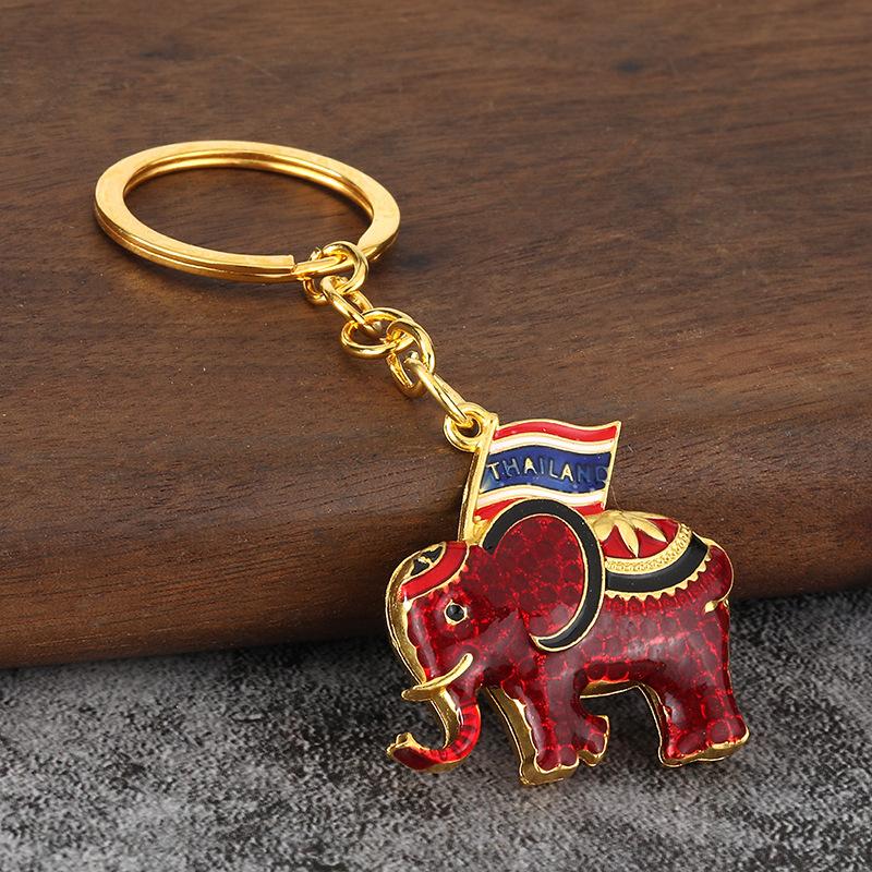 Elefante de Guerra Esmaltado Tailandia Venta Caliente Elefante con Goteo de Aceite Colgante de Llavero para Coche Pequeño Regalo